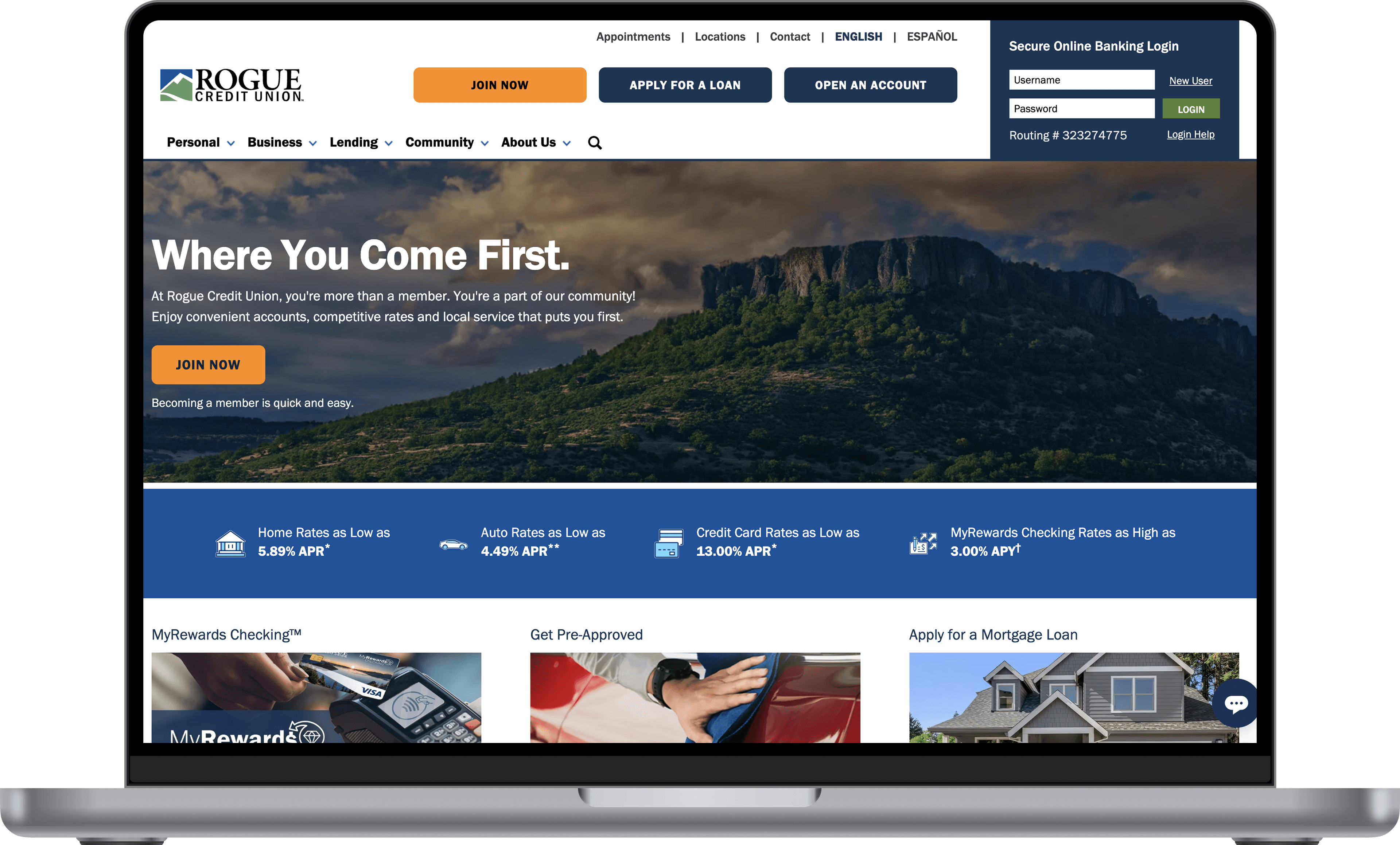 The redesigned Rogue Credit Union homepage shown on a laptop.