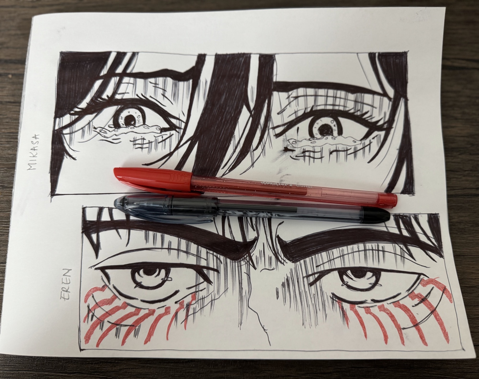 A pen drawing of two pairs of eyes.